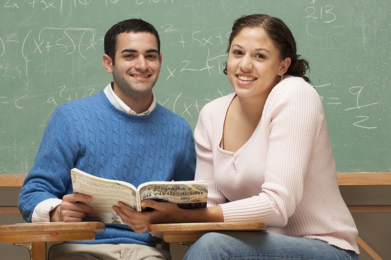 Students studying in classroom Students studying in classroom