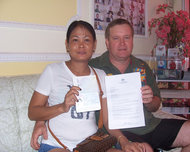 Happy Couple With Official Documents