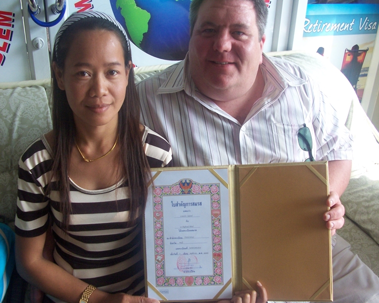 Happy Couple With Official Documents