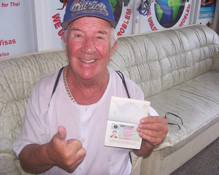 Happy client smiling with his visa