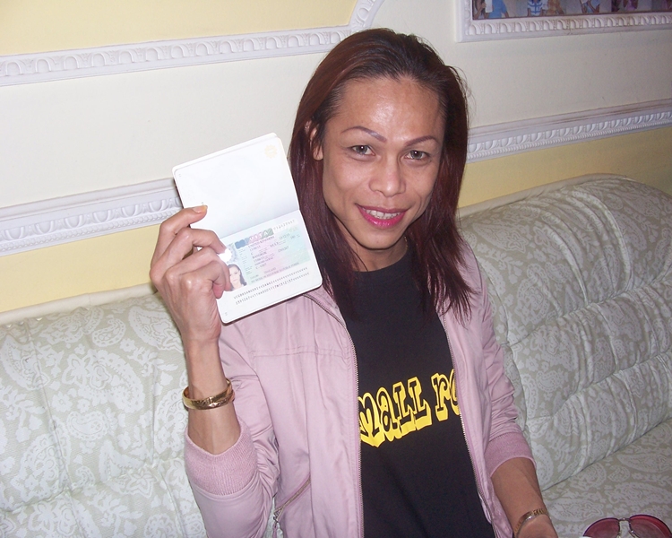 Sawai smiling with her visa