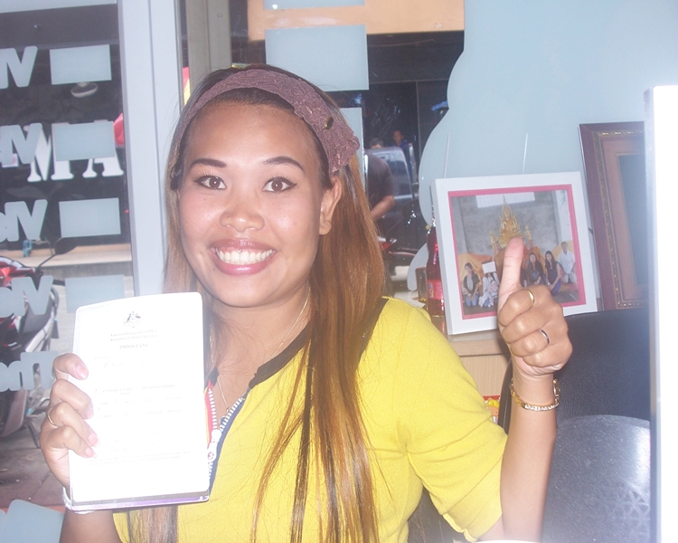 Happy client Kalayanee with her visa