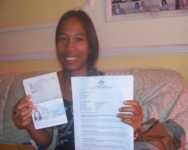 Happy client Phaengpraew smiling with her visa