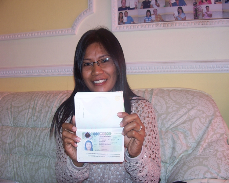 Sangat, happy with her visa