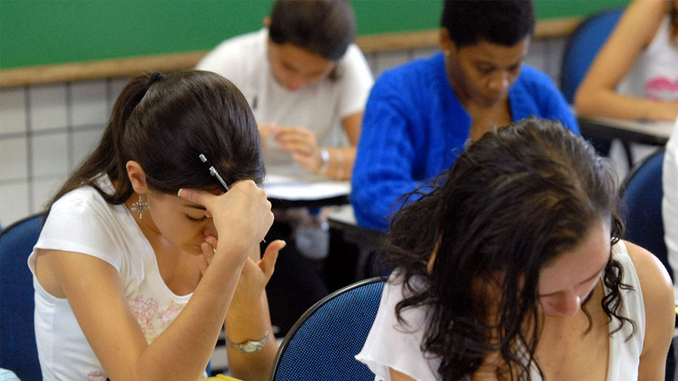 Students concentrating on a test