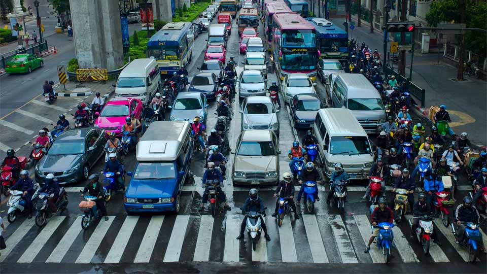 A whole lot of motorcycles in Bangkok traffic