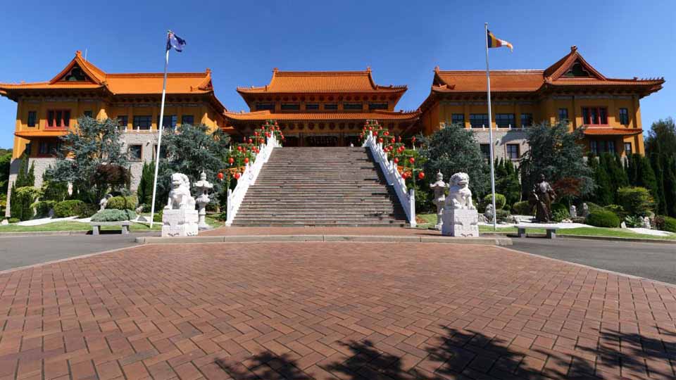 Front steps up to an impressive Buddhist temple