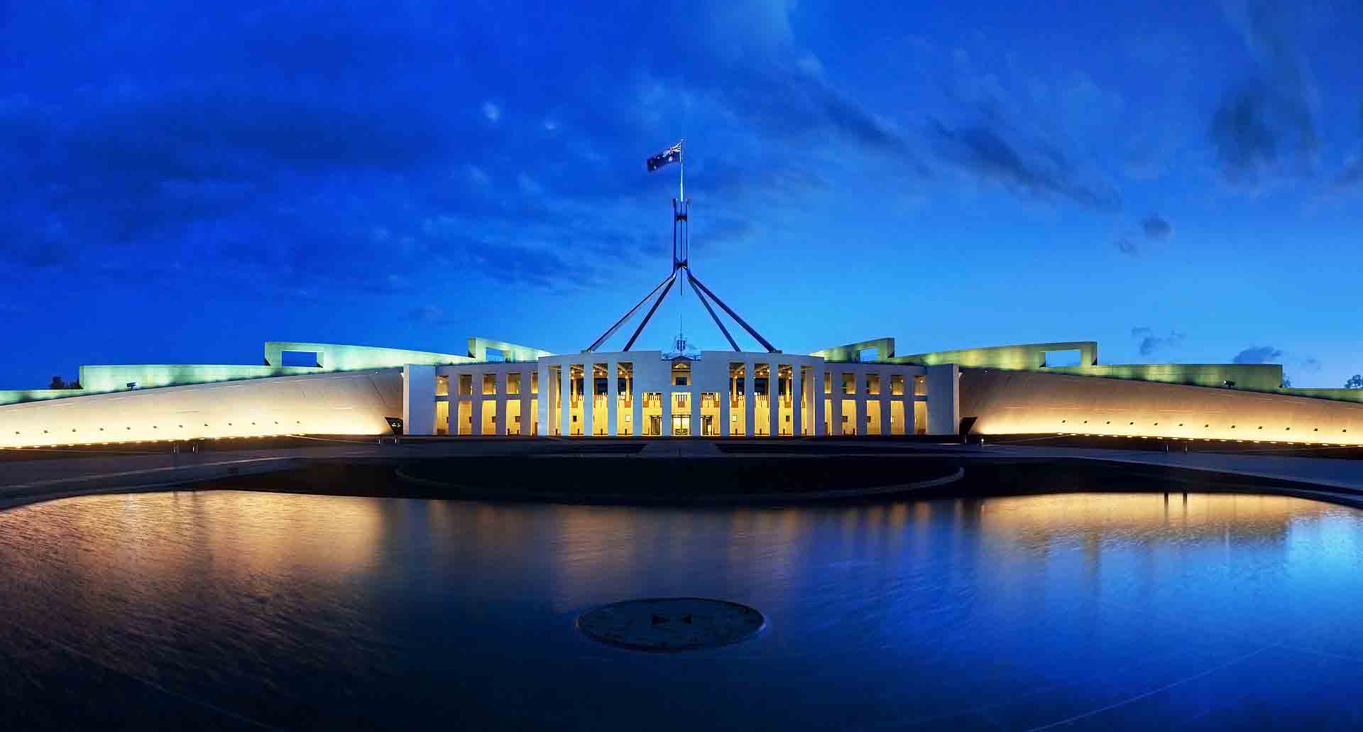 Panoramic shot of an Australian official building in the evening