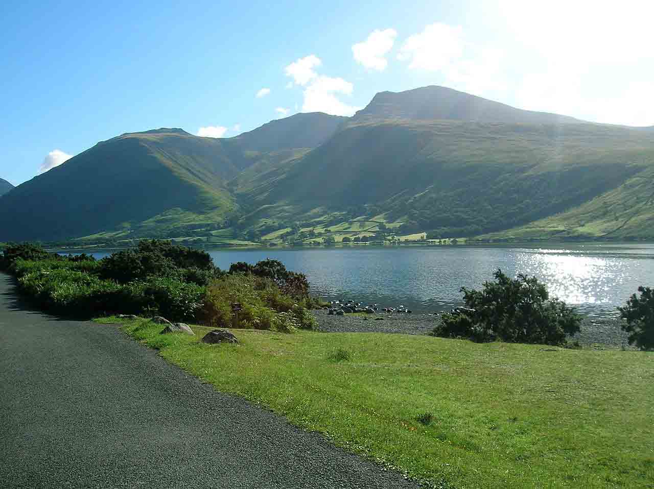 A beautiful, verdant mountain range with a river in the foreground