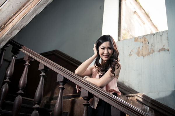 Thai girl on vintage stairs