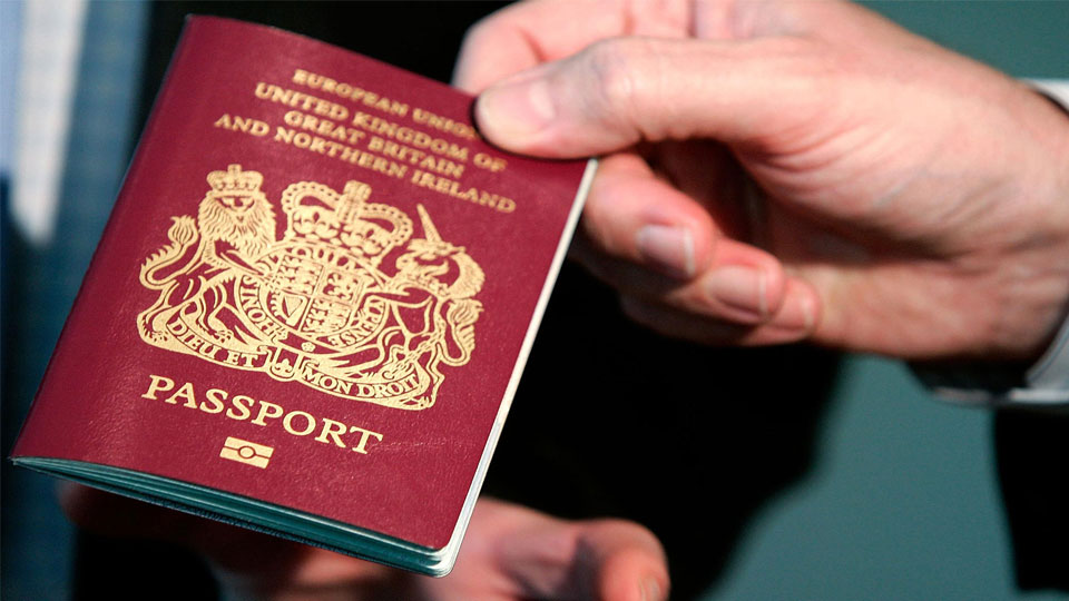 british visa held in hand