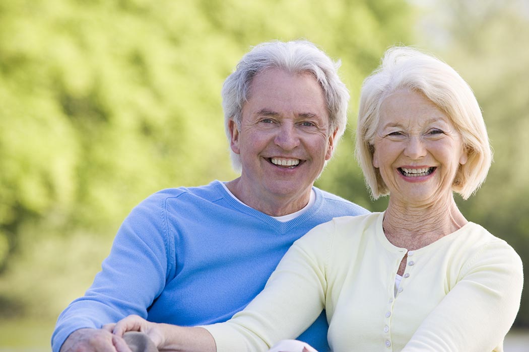 Couple outdoors smiling