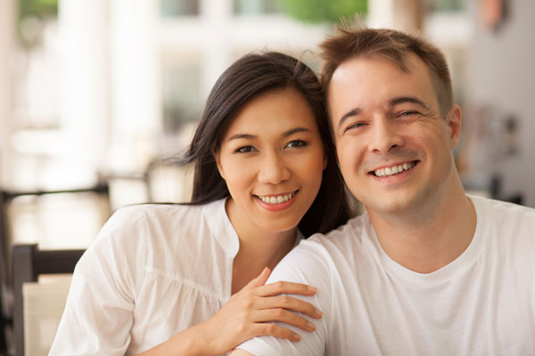 My Thai girlfriend is divorced from UK husband and now resides with me. How can she stay in UK?